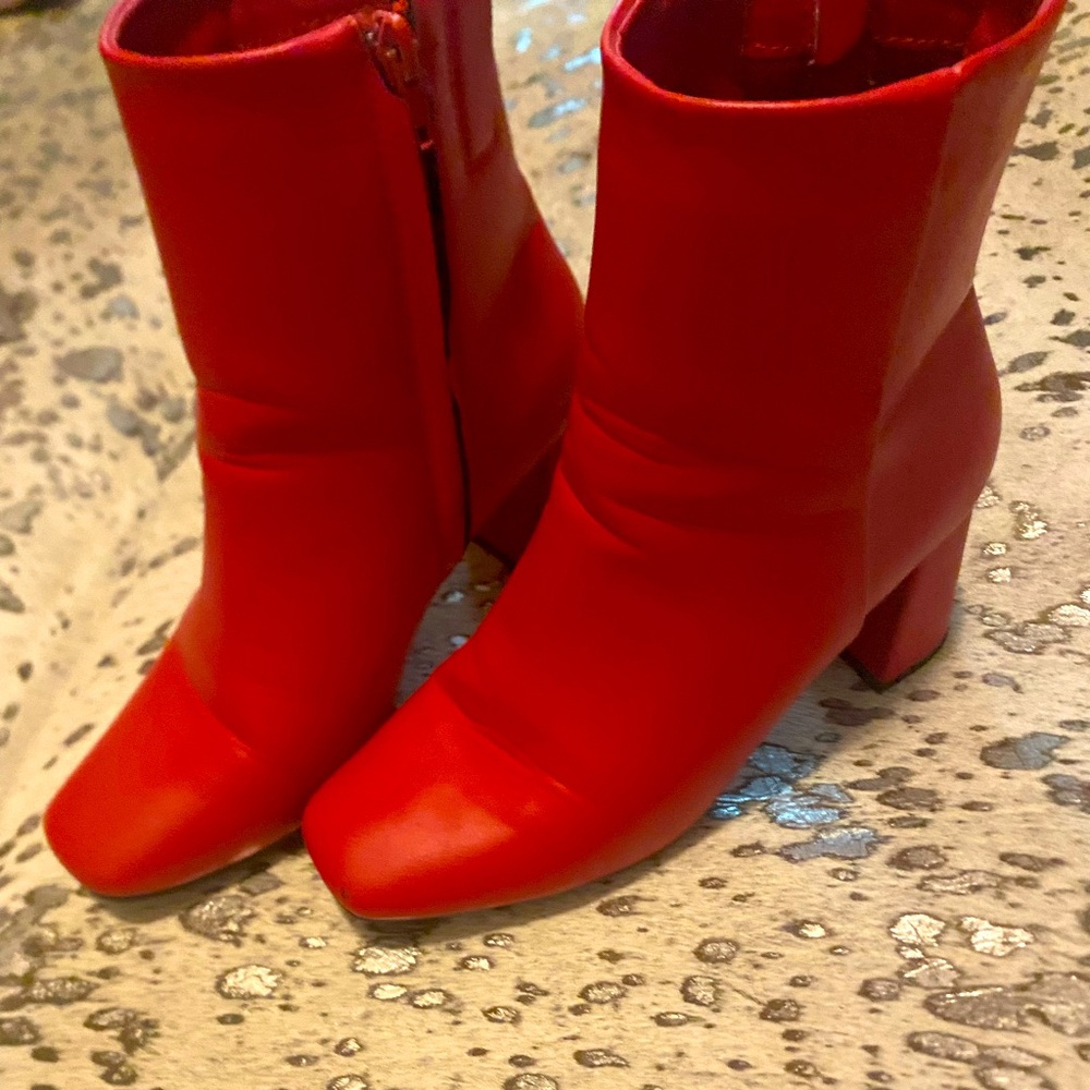 Bright red heeled booties